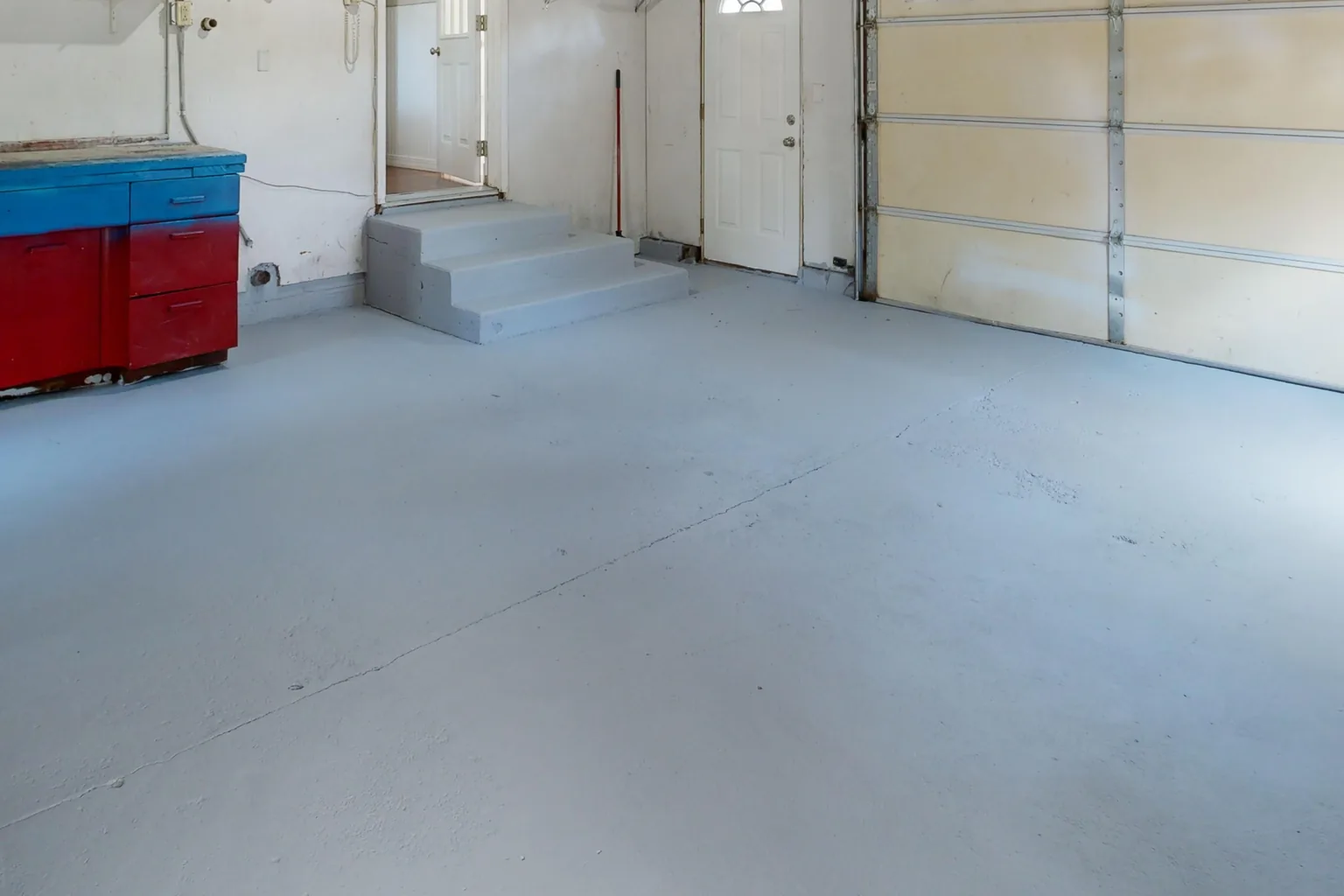 A DIY garage floor coating, day 1 (stock photograph)